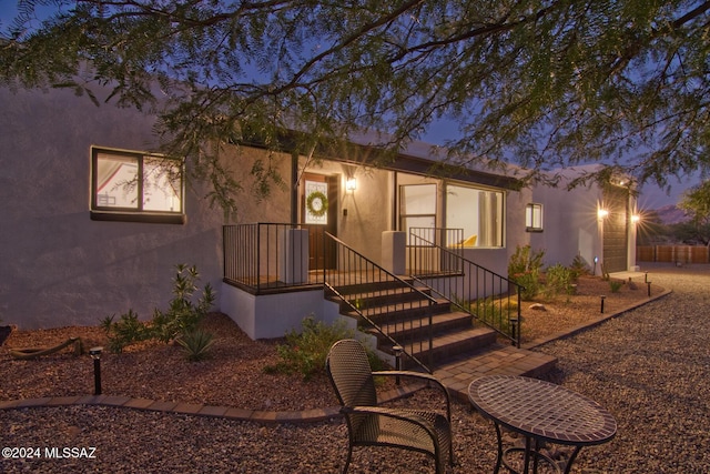 view of front of property featuring stucco siding
