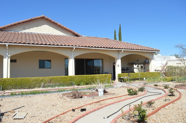 1445 W Fairway Dr, Nogales, AZ 85621 - rear view of property featuring a tile roof and stucco siding