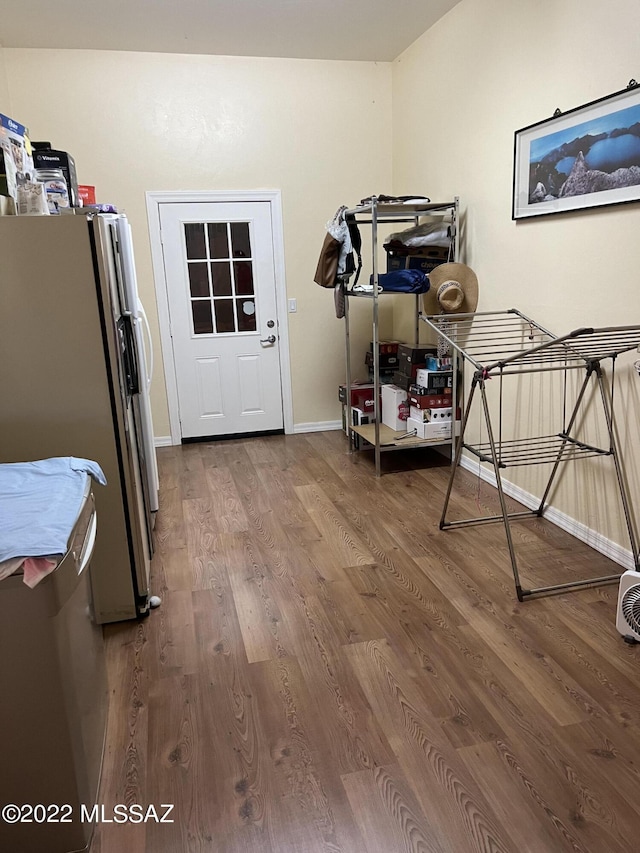 1445 W Fairway Dr, Nogales, AZ 85621 - dining space featuring baseboards and wood finished floors