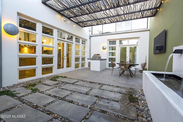 view of patio / terrace featuring french doors