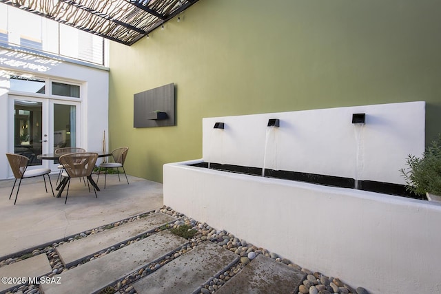 view of patio / terrace featuring french doors