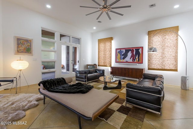 living area with recessed lighting, french doors, visible vents, and ceiling fan