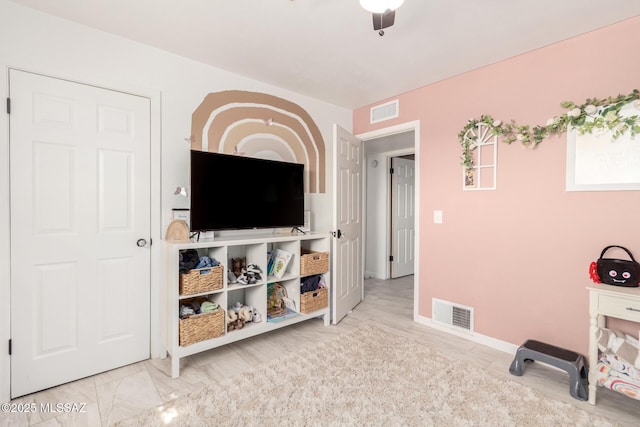 interior space with marble finish floor, baseboards, and visible vents