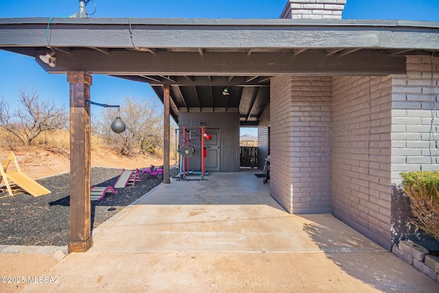 view of patio / terrace featuring a carport