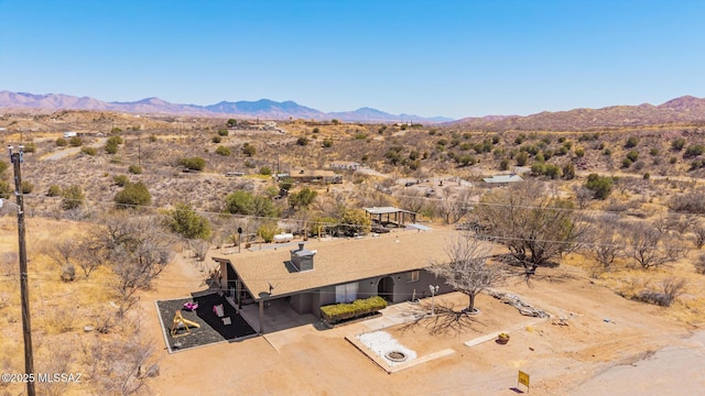 bird's eye view featuring view of desert and a mountain view