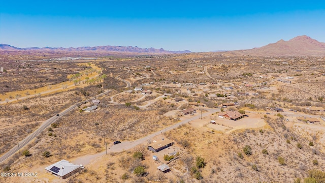 bird's eye view featuring a mountain view and view of desert