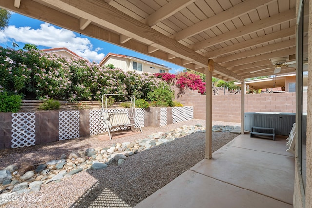 4654 W Gatehinge Ct, Tucson, AZ 85741 - view of patio / terrace with a fenced backyard and a hot tub