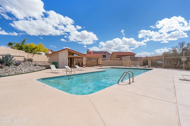 4654 W Gatehinge Ct, Tucson, AZ 85741 - community pool featuring a patio area