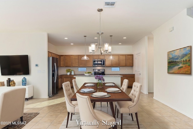 6866 E Via Arroyo Largo, Tucson, AZ 85756 - dining room with light tile patterned floors, recessed lighting, and a chandelier