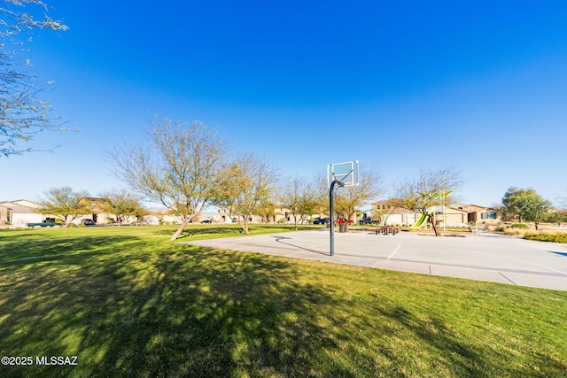 6866 E Via Arroyo Largo, Tucson, AZ 85756 - view of basketball court featuring a lawn, community basketball court, and a residential view