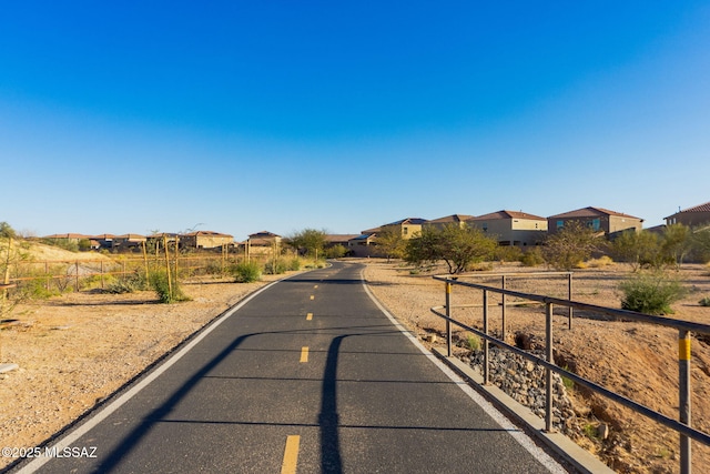 6866 E Via Arroyo Largo, Tucson, AZ 85756 - view of asphalt road with a residential view