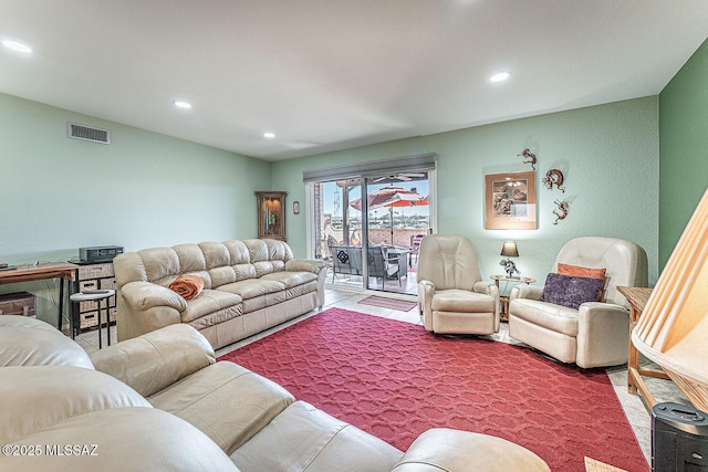 living room with visible vents and recessed lighting