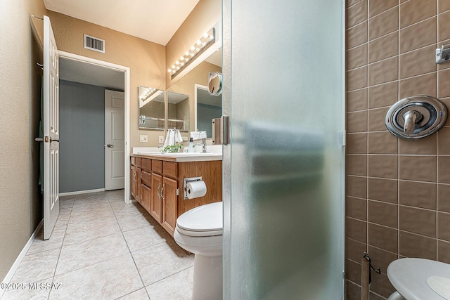 bathroom with a shower stall, visible vents, toilet, and tile patterned flooring