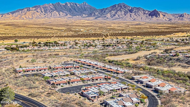 birds eye view of property featuring a mountain view and a residential view