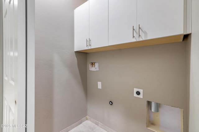 9121 W Claude St, Tucson, AZ 85735 - laundry area featuring tile patterned floors, washer hookup, cabinet space, baseboards, and hookup for an electric dryer
