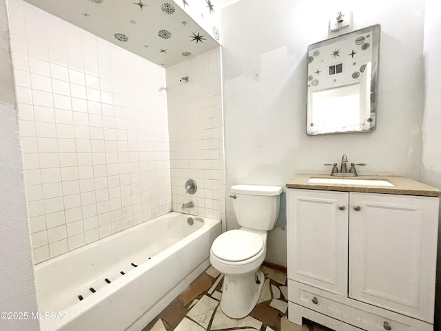 bathroom featuring toilet, shower / bath combination, and vanity