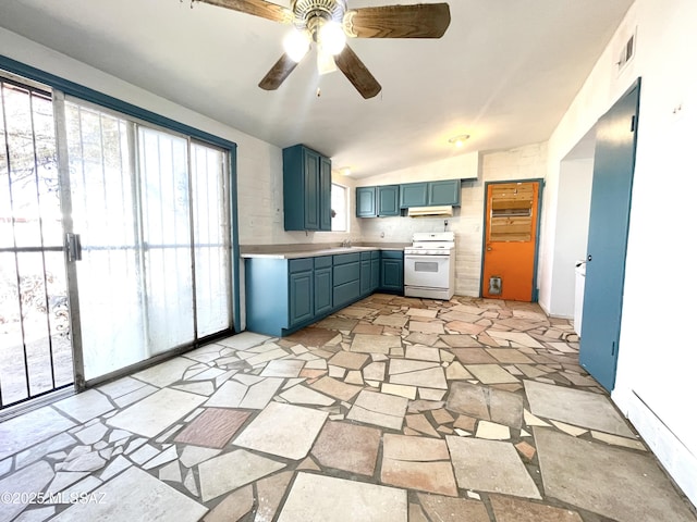 kitchen with light countertops, ceiling fan, blue cabinetry, stone tile flooring, and white range with gas cooktop