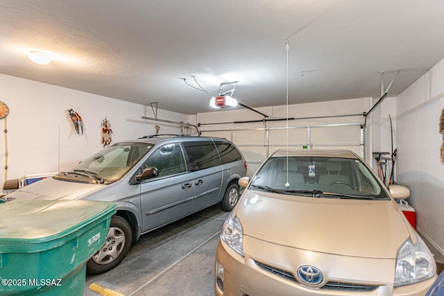 garage featuring a garage door opener