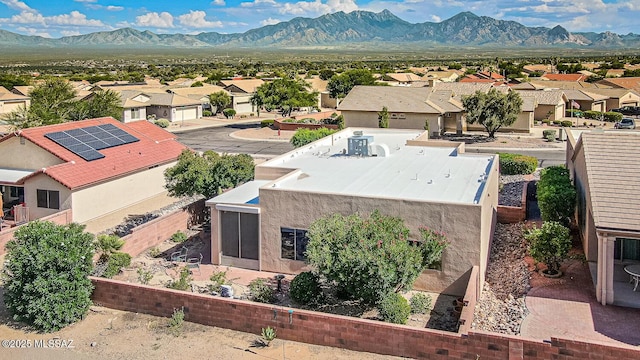 birds eye view of property with a residential view and a mountain view