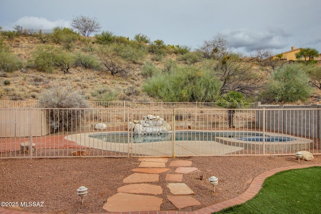 view of pool featuring a fenced in pool, a fenced backyard, and a patio area