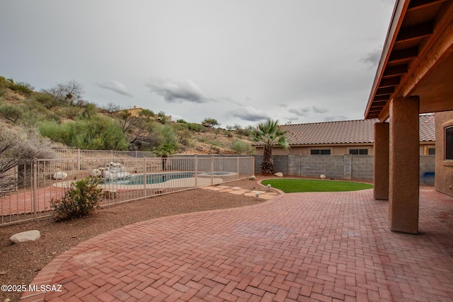 view of patio / terrace with a fenced in pool and a fenced backyard