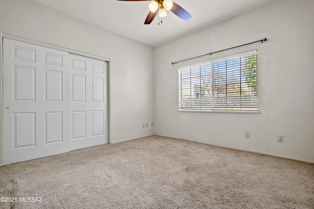 420 E Deers Rest Pl, Tucson, AZ 85704 - unfurnished bedroom with a ceiling fan, carpet floors, and a closet