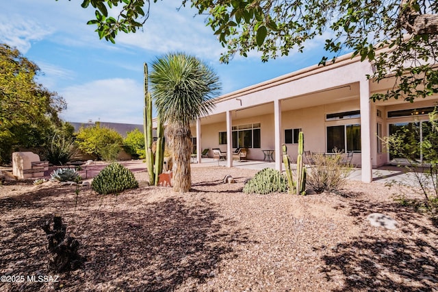 420 E Deers Rest Pl, Tucson, AZ 85704 - rear view of property featuring a patio and stucco siding