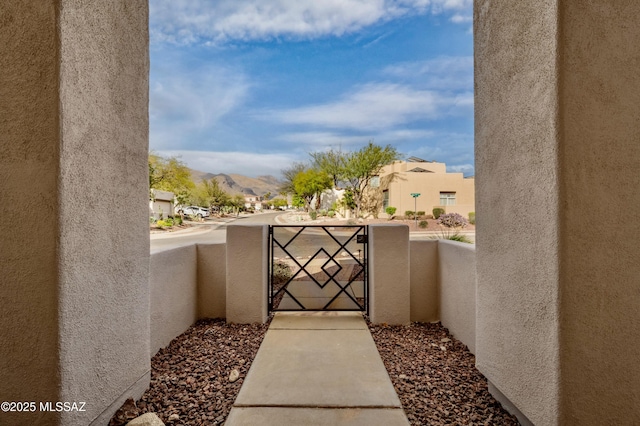 420 E Deers Rest Pl, Tucson, AZ 85704 - view of gate featuring a residential view, a mountain view, and fence
