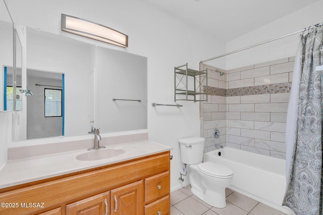 full bathroom featuring toilet, vanity, shower / bath combination with curtain, and tile patterned flooring