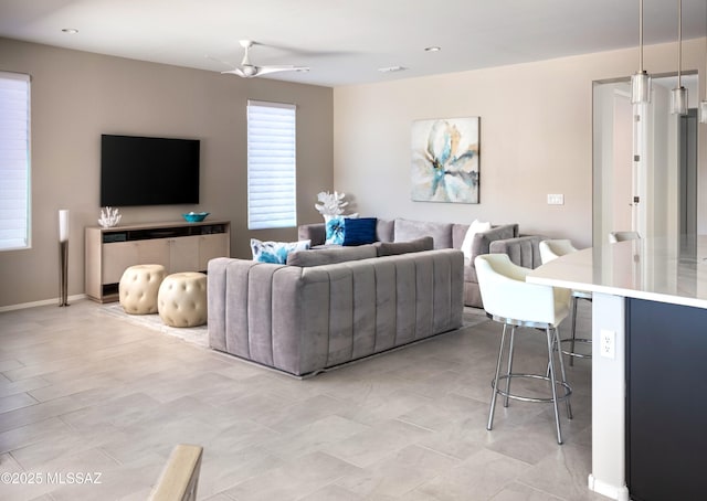 6949 W Tanner Trl, Marana, AZ 85658 - living area with a ceiling fan and baseboards