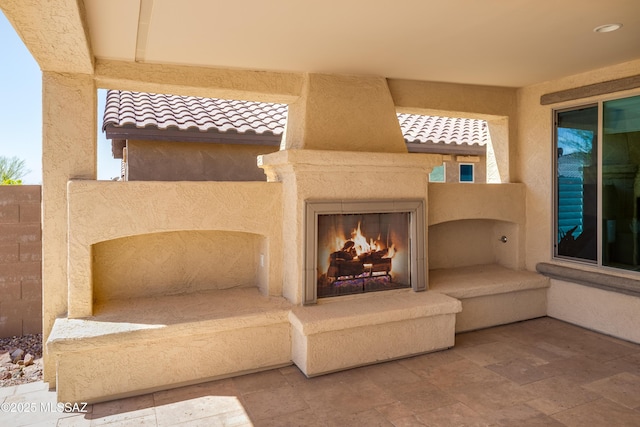 6949 W Tanner Trl, Marana, AZ 85658 - view of patio with a premium fireplace