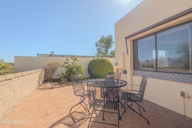 view of patio with outdoor dining area