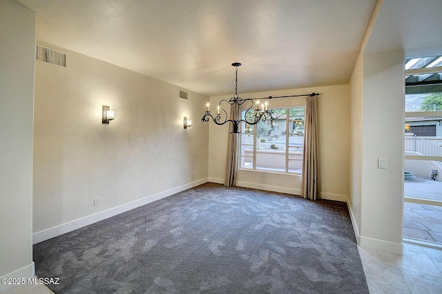 7222 E Desert Moon Loop, Tucson, AZ 85750 - unfurnished dining area with a chandelier, baseboards, and carpet
