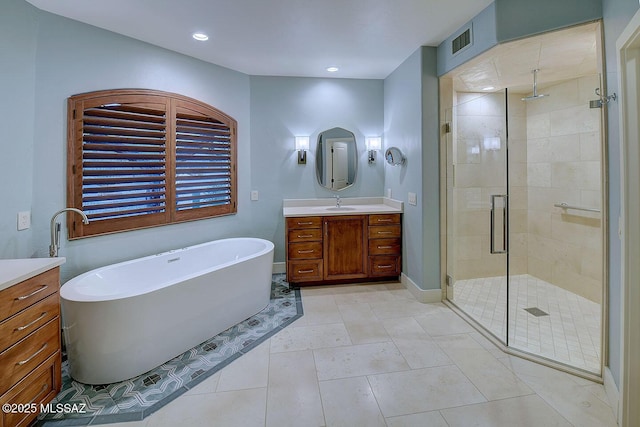 7222 E Desert Moon Loop, Tucson, AZ 85750 - full bath with vanity, a stall shower, a freestanding bath, recessed lighting, and baseboards