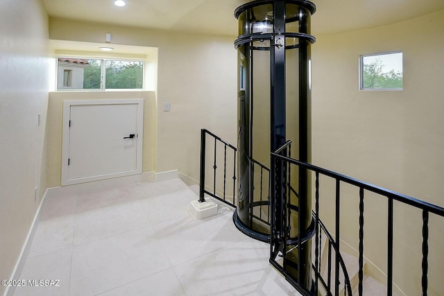 7222 E Desert Moon Loop, Tucson, AZ 85750 - hall featuring an upstairs landing, tile patterned floors, recessed lighting, and baseboards