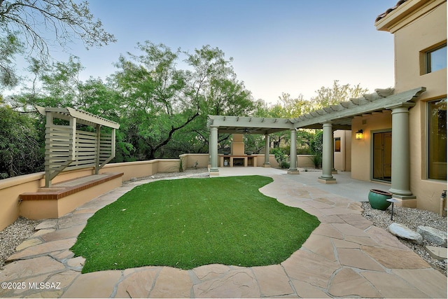 7222 E Desert Moon Loop, Tucson, AZ 85750 - view of yard featuring a fireplace, a pergola, and a patio