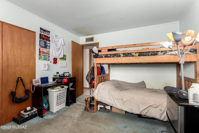 bedroom featuring carpet flooring and visible vents