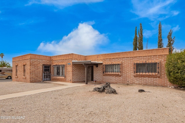 view of front of property with brick siding