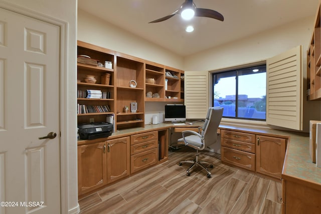 875 S Corte Monte Cristo, Green Valley, AZ 85614 - office with light wood finished floors, built in study area, and a ceiling fan