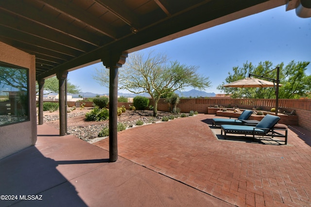 875 S Corte Monte Cristo, Green Valley, AZ 85614 - view of patio featuring a fenced backyard and an outdoor hangout area