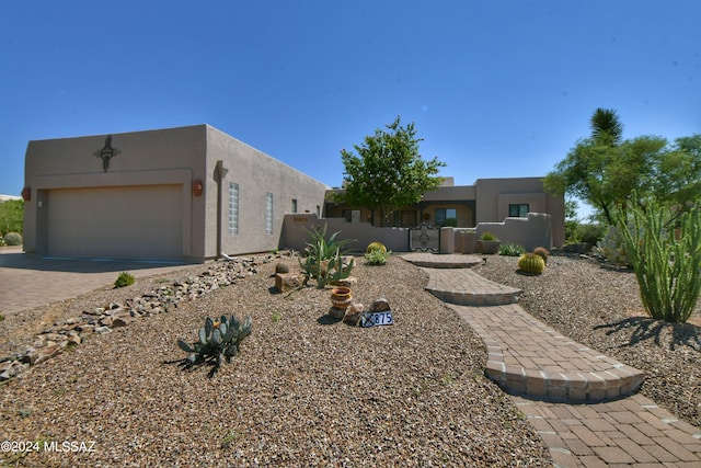 875 S Corte Monte Cristo, Green Valley, AZ 85614 - view of front of home featuring fence, a garage, driveway, and stucco siding
