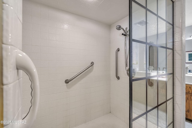 full bath featuring a stall shower and visible vents