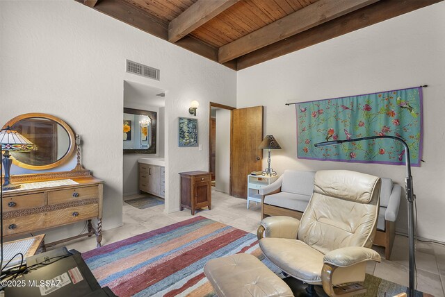 living area featuring visible vents, wooden ceiling, and beam ceiling