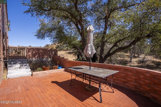 deck featuring outdoor dining space