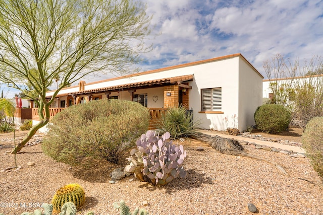 view of front of property featuring stucco siding