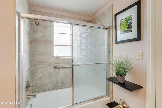 bathroom featuring enclosed tub / shower combo