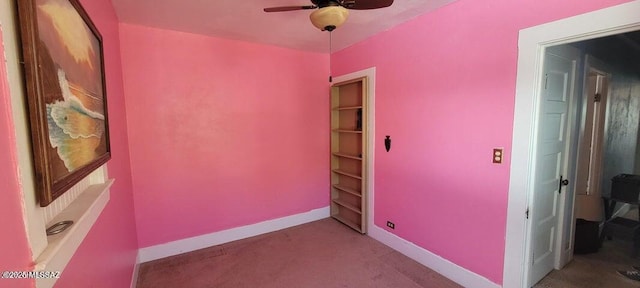 interior space featuring baseboards