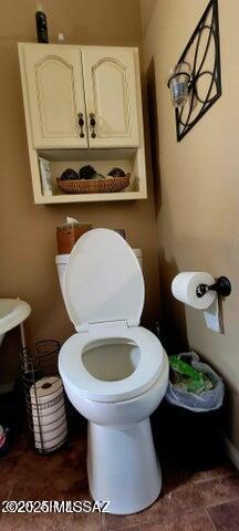 bathroom featuring toilet