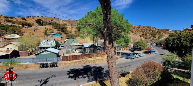 birds eye view of property with a mountain view