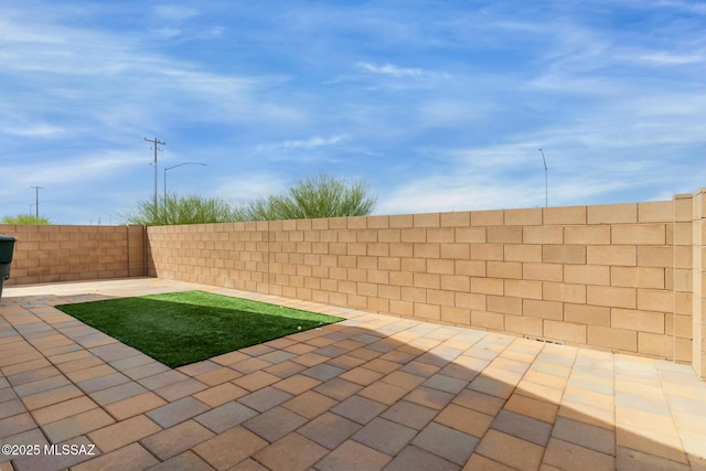 view of patio featuring a fenced backyard
